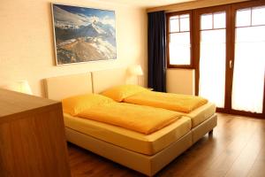 Katil atau katil-katil dalam bilik di Hotel Sonnenhof