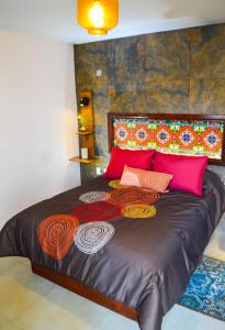 Voodi või voodid majutusasutuse Hotel Las Candelas de Huamantla toas