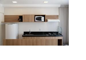 Een keuken of kitchenette bij Flat Verano Stay Barra da Tijuca