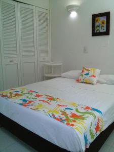 Postel nebo postele na pokoji v ubytování Condominio Girardot Resort