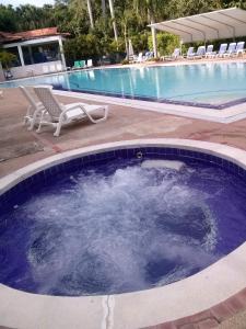 Bazén v ubytování Condominio Girardot Resort nebo v jeho okolí