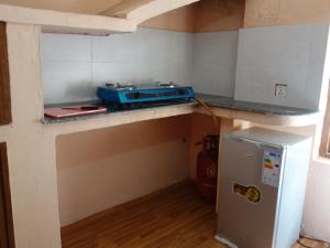 Kuchyň nebo kuchyňský kout v ubytování Bodhi Apartment hotel