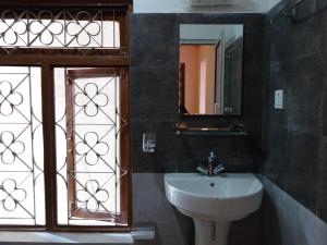 Ένα μπάνιο στο Bodhi Apartment hotel