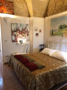 Postel nebo postele na pokoji v ubytování B&B Corte Dei Musco