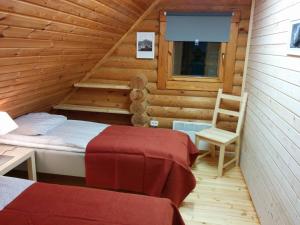 Postel nebo postele na pokoji v ubytování Safari House