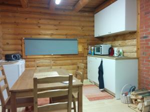 Kuchyň nebo kuchyňský kout v ubytování Safari House
