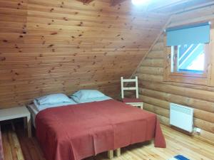 Postel nebo postele na pokoji v ubytování Safari House