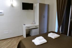 Posteľ alebo postele v izbe v ubytovaní B&B Il Campanile