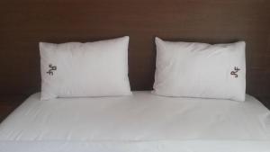 Voodi või voodid majutusasutuse RF Hotel toas