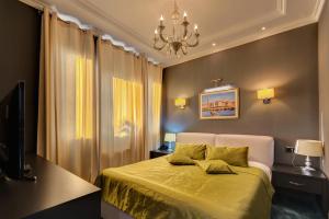 Letto o letti in una camera di Hotel Astoria