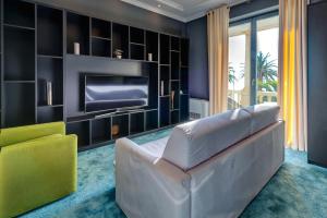 TV o dispositivi per l'intrattenimento presso Hotel Astoria