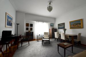 A television and/or entertainment centre at Athens Squared Apartments