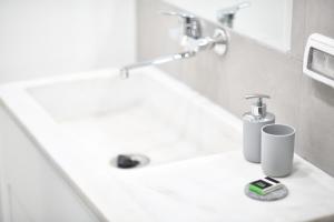 A bathroom at Athens Squared Apartments