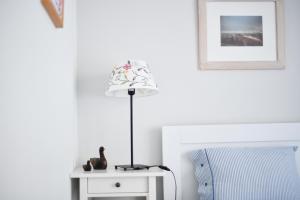 A bed or beds in a room at Athens Squared Apartments