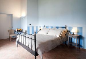 Cama o camas de una habitación en Affittacamere Il Torchio
