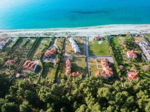an aerial view of a estate next to the ocean at Sunset Villas in Possidi