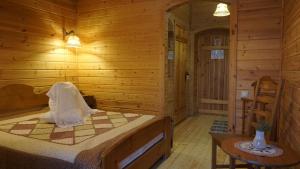En eller flere senger på et rom på Eco Hotel Suzdal Inn