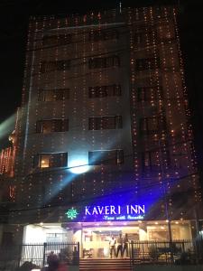 a building with a kaveri inn sign on it at night at Kaveri Inn in Kathmandu