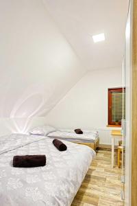 Ένα ή περισσότερα κρεβάτια σε δωμάτιο στο Šnekolend