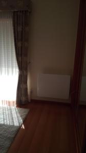 Ένα ή περισσότερα κρεβάτια σε δωμάτιο στο Quarto/Suite de Charme