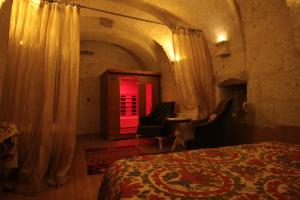 Sakli Konak Cappadocia Hotel&Restaurantにあるベッド