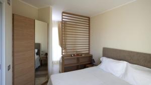 Posteľ alebo postele v izbe v ubytovaní Di Toscana Holidays