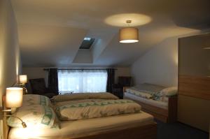 Postel nebo postele na pokoji v ubytování Haus Waldrast