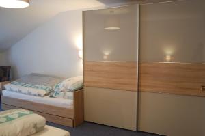 Postel nebo postele na pokoji v ubytování Haus Waldrast