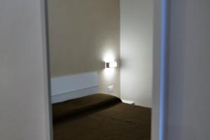 Posteľ alebo postele v izbe v ubytovaní B&B Il Campanile