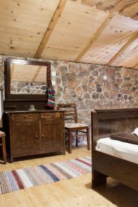 Ein Bett oder Betten in einem Zimmer der Unterkunft Solovi Dvori