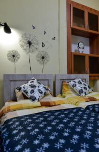 Postel nebo postele na pokoji v ubytování Nana's Home