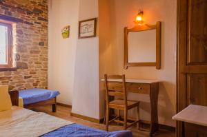 Postel nebo postele na pokoji v ubytování Alexis New Villas
