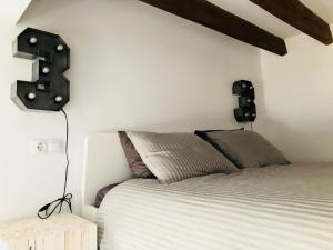 Posteľ alebo postele v izbe v ubytovaní White Loft Alicante