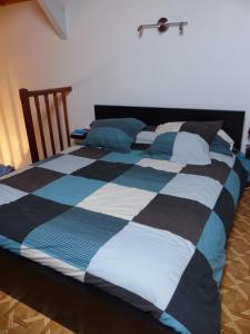 מיטה או מיטות בחדר ב-Appartement Duplex