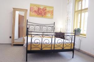 Postel nebo postele na pokoji v ubytování Apartmány V Podzámčí II.