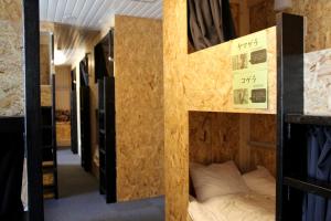 Postel nebo postele na pokoji v ubytování Guesthouse Masago