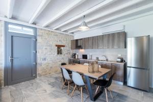 Kuchyň nebo kuchyňský kout v ubytování Paros Villas Nereids