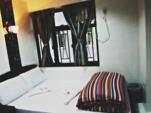 Postelja oz. postelje v sobi nastanitve Woodstock Hostel