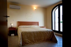 Postel nebo postele na pokoji v ubytování Hotel Salento + 37 fotografií