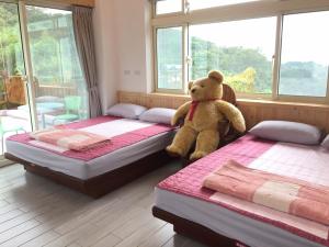 Katil atau katil-katil dalam bilik di Fei Ying Homestay
