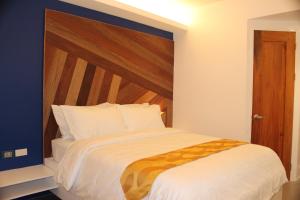 Posteľ alebo postele v izbe v ubytovaní OYO 609 G Executive Hotel And Spa Boracay