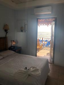 Giường trong phòng chung tại Hotel El Casino