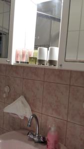 A bathroom at Heni Apartman