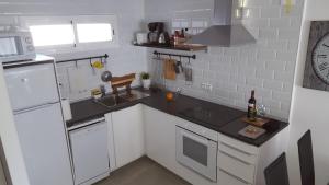 Kuchnia lub aneks kuchenny w obiekcie Bonanza Apartment