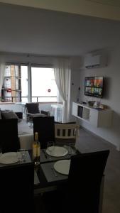 TV a/nebo společenská místnost v ubytování Bonanza Apartment