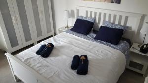 Postel nebo postele na pokoji v ubytování Bonanza Apartment + 37 fotografií
