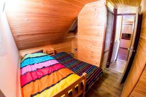 Postel nebo postele na pokoji v ubytování Rogla Chalet Urska