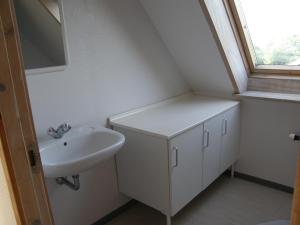 Ванная комната в Feriestedet Skovly