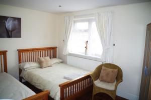 Кровать или кровати в номере Abbey Lodge Guest House