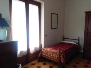 Postel nebo postele na pokoji v ubytování Il Vigneto